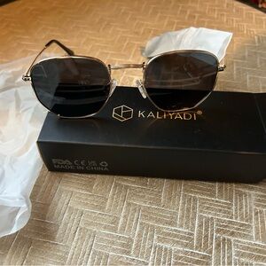 Black Aviator Sunglasses with Metal Frame and Dark Lenses